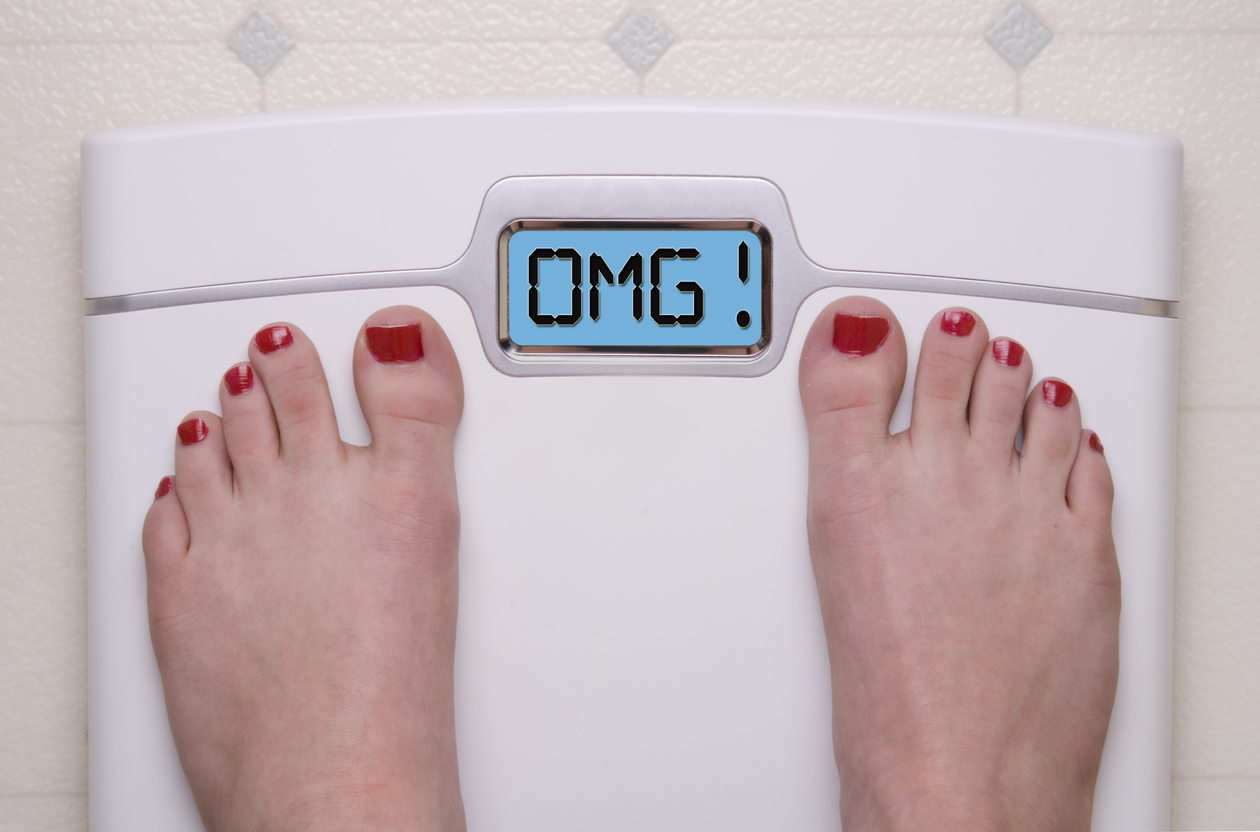 Digital Bathroom Scale Displaying OMG Message