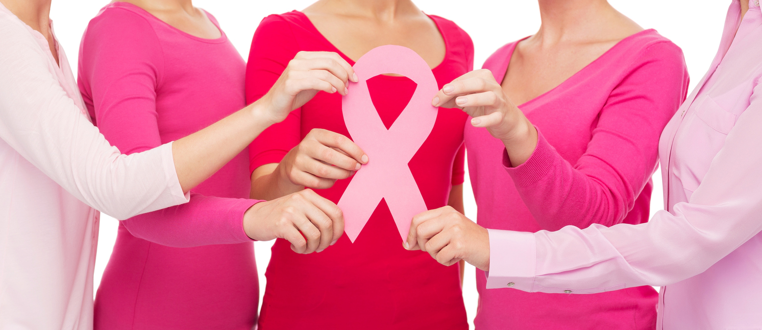 healthcare, people and medicine concept - close up of women in blank shirts with pink breast cancer awareness ribbon over white background