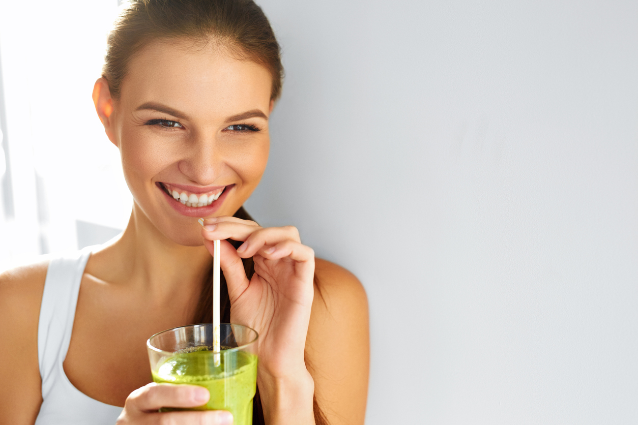Healthy Food Eating. Woman Drinking Smoothie. Diet. Lifestyle. Nutrition
