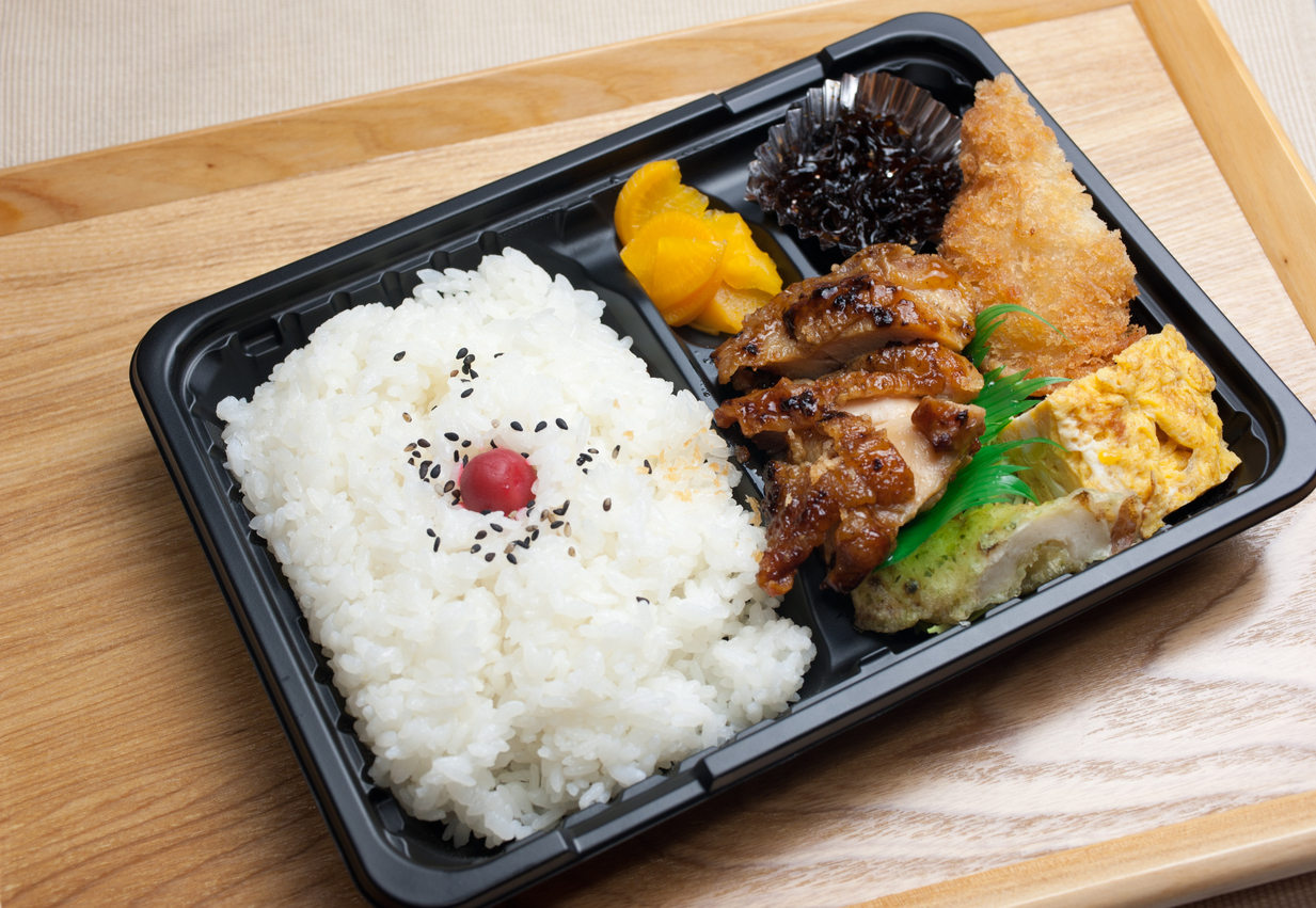Bento (弁当 bentō) is a single-portion takeout or home-packed meal common in Japanese cuisine. A traditional bento consists of rice, fish or meat, and one or more pickled or cooked vegetables, usually in a box-shaped container. Containers range from disposable mass produced to hand crafted lacquerware. Although bento are readily available in many places throughout Japan, including convenience stores, bento shops (弁当屋 bentō-ya), train stations, and department stores, it is still common for Japanese homemakers to spend time and energy for their spouse, child, or themselves producing a carefully prepared lunch box.