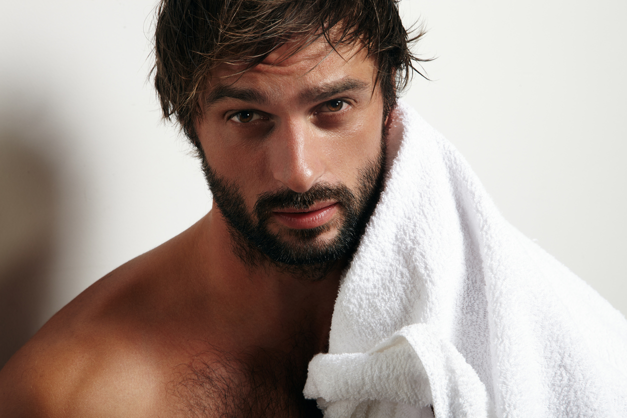 man after bath with a white towel