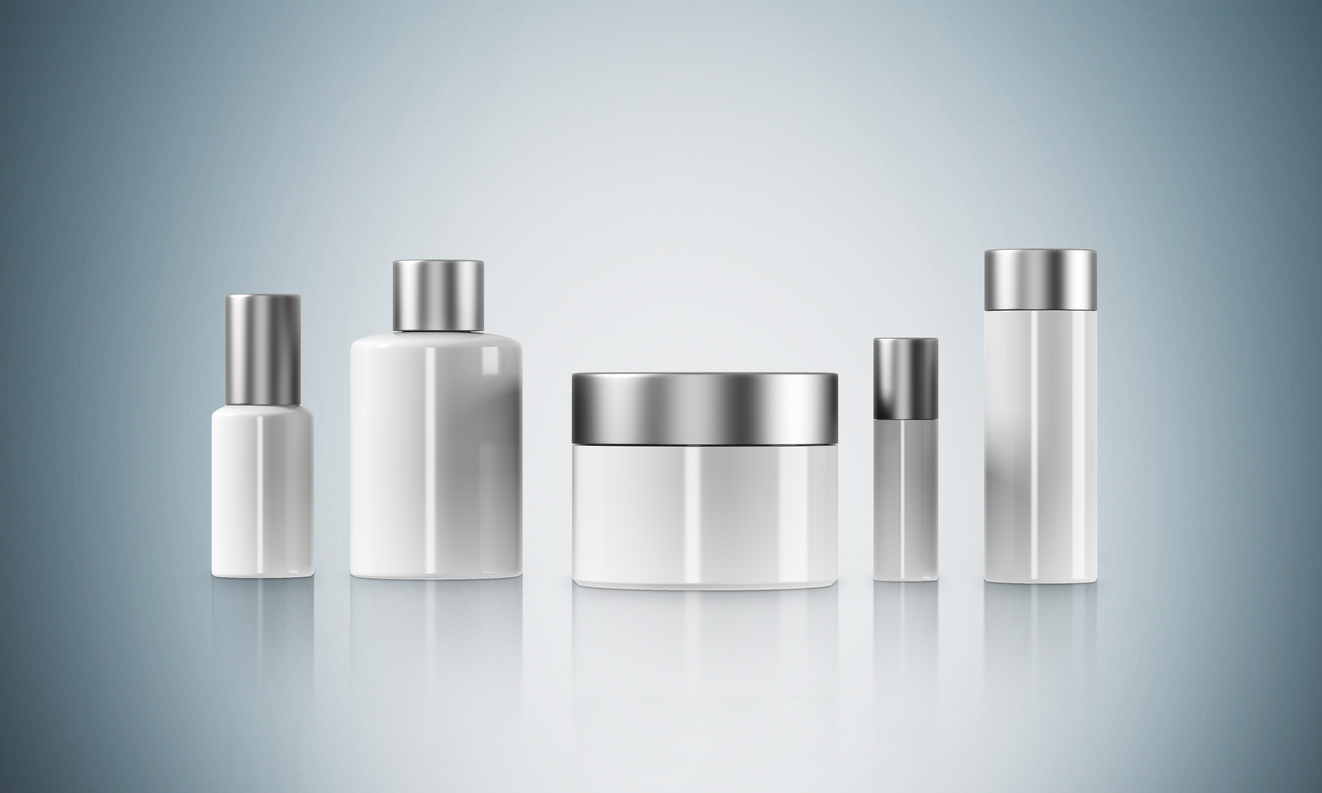 Row of cream boxes of different shapes. Grey background. Concept of cosmetics. Mock up. 3D rendering