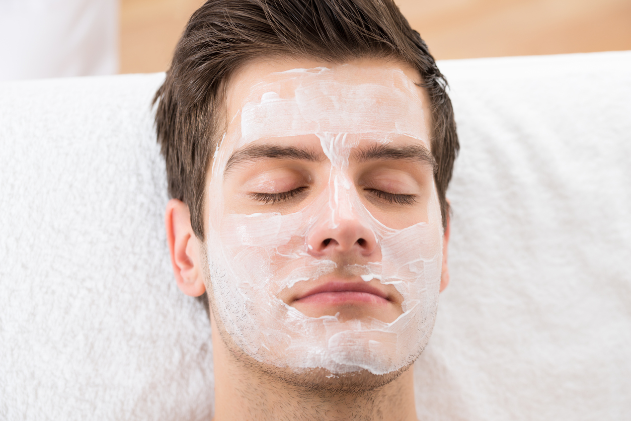 Face Mask Applied To A Young Man In A Spa
