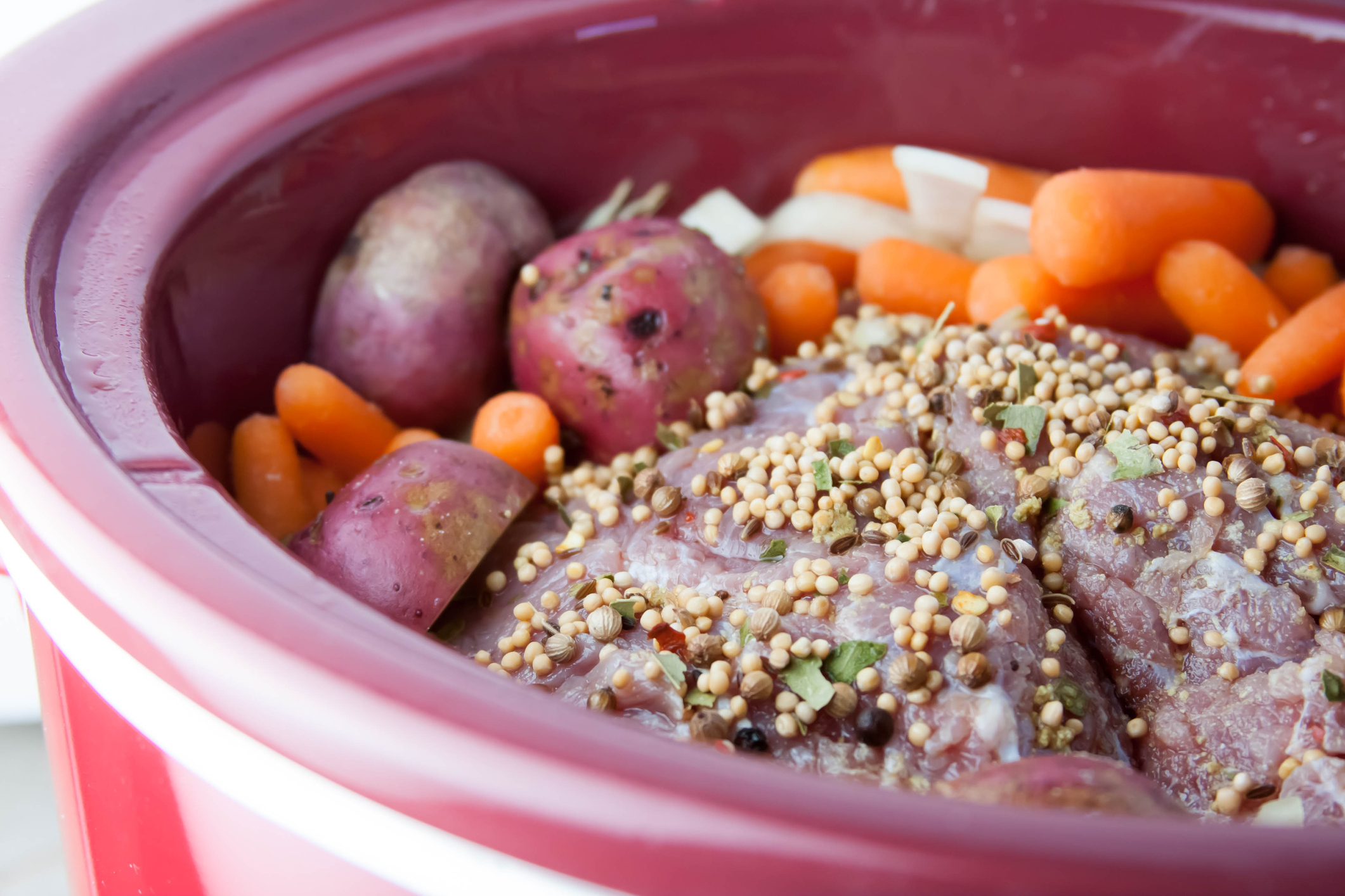 Traditional corned beef and cabbage in a slow cooker