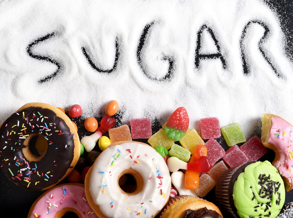 mix of sweet cakes, donuts and candy with sugar text